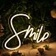 Smile Yellow Neon Sign for Positive and Fun Spaces