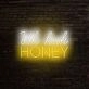 Uh Huh Honey Neon Sign V2 for playful and affectionate settings