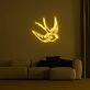 Swallow Neon Sign adds a whimsical touch