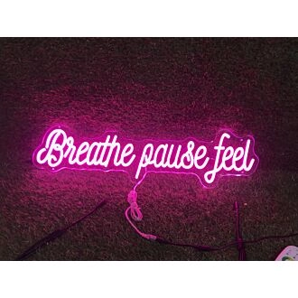 Brighten Up Your Space: Breathe Pause Feel Pink LED Neon Sign Perfect for Home Decor, Relaxing Office Environments, and Trendy Bar Settings.