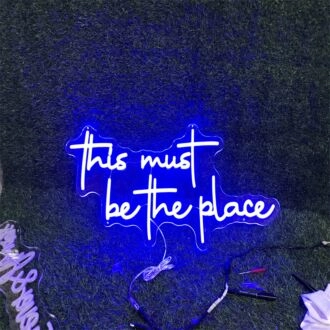 Brighten Your Evening Events to Everyday Spaces: "This Must Be The Place Blue Custom Neon Sign" for Weddings, Bars, and Home Decor.