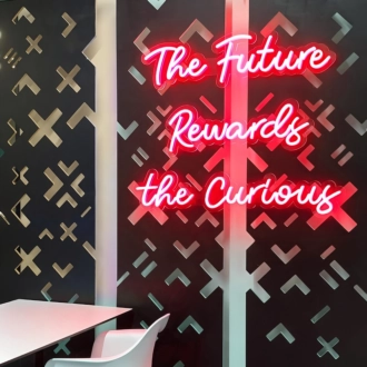 'The Future Rewards The Curious ' Neon Sign