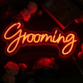 Grooming Orange Neon Sign