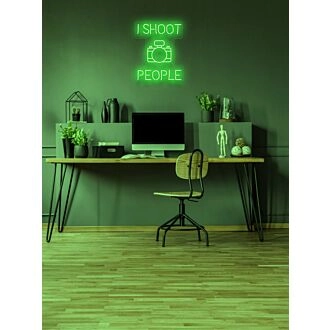 I shoot people Photographer's Neon Tribute to Capturing Moments