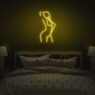Die weibliche Figur feiert Schönheit mit elegantem Neon.