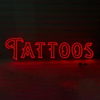 Tattoos Illuminate Your Space with Neon Art