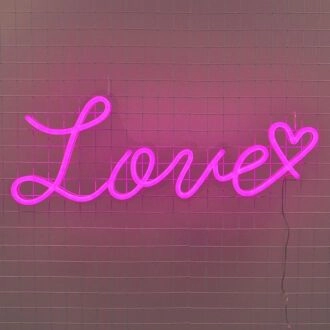 Love Heart Neon Sign creates a romantic atmosphere