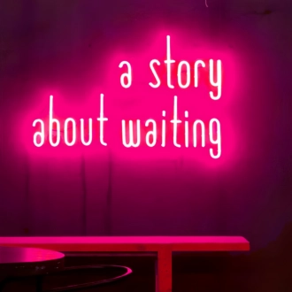 A story of waiting neon sign