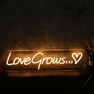 Love Grows Yellow Neon Sign