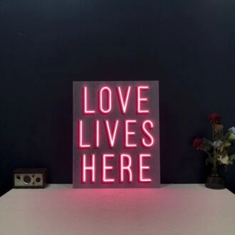 Love Lives Here Neon Sign