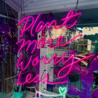 Plant More Worry Less: Illuminate Your Space with Neon Relaxation