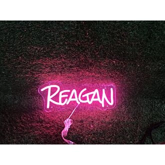 Light Up Your Space: Reagan Pink LED Neon Sign for Bars, Weddings, and Festive Home Decor
