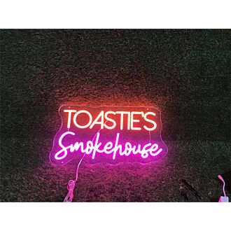Brighten Up Your Space: From Home Decor to Bars, Make a Statement with Toasties Smokehouse Custom LED Neon Sign.