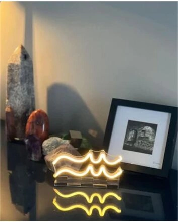 Brighten up your bar, home, and office ambiance with the Wave Line LED Neon Sign.