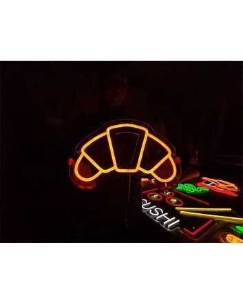 Brighten Your Bakery or Cafe Ambiance with the Charming Croissant LED Neon Sign: Perfect for Home Kitchens, Trendy Coffee Shops, and French Bistro Decor.