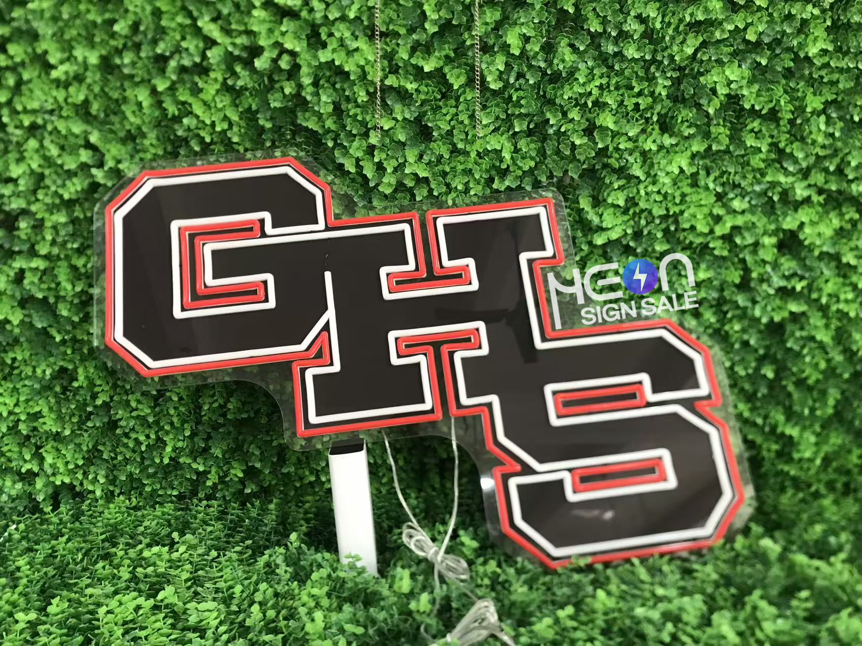 Finished black-background school initials with lights off